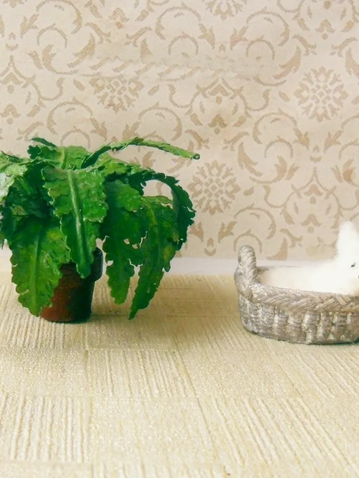 Cat. Cat in a basket dollhouse miniature. Scale 1:12. Puppet miniature.