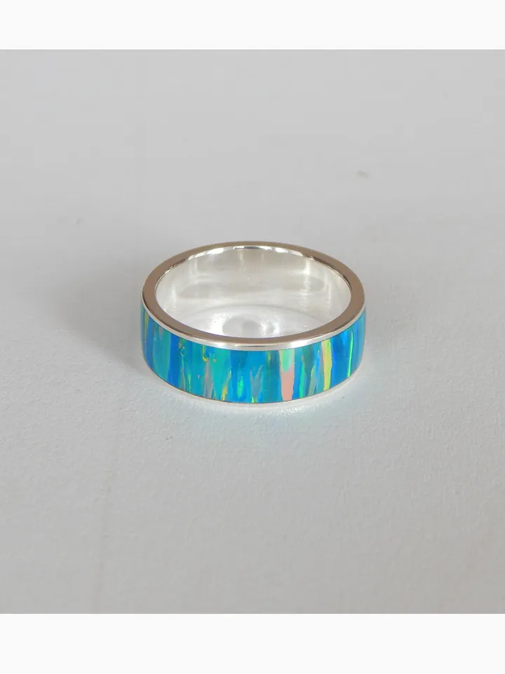 Silver ring with synthetic opal. Exclusive ring as a gift.