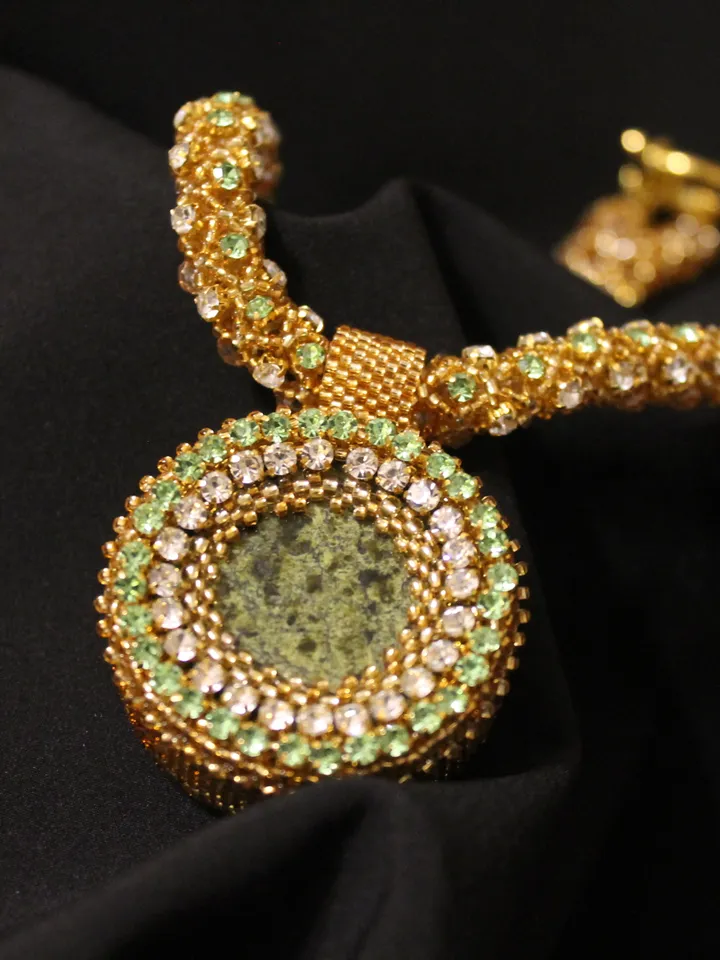 Pendant Japanese beads with a coil and rhinestones
