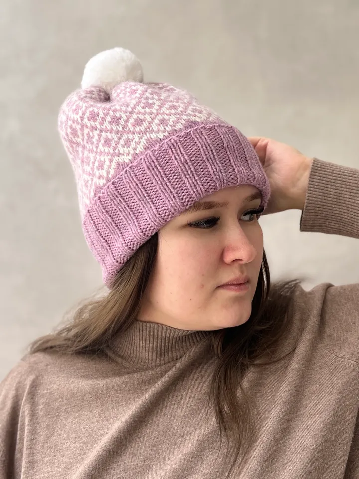 Warm womens hand-knitted hat