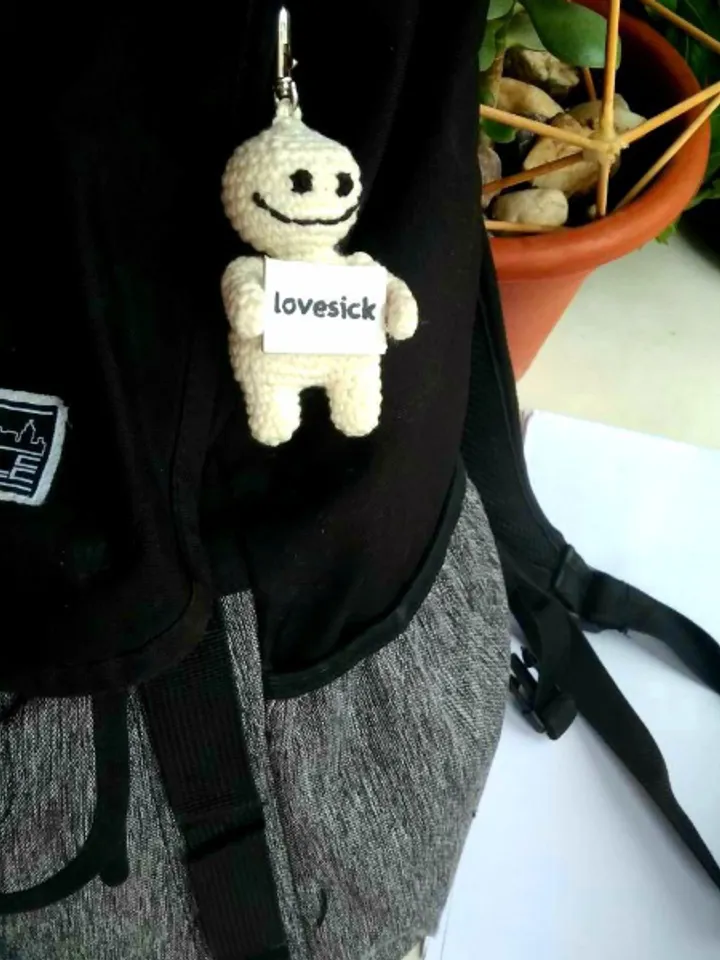 The keychain "lovesick" for a bag or keys, a toy in the car interior, a pendant for the rearview mirror