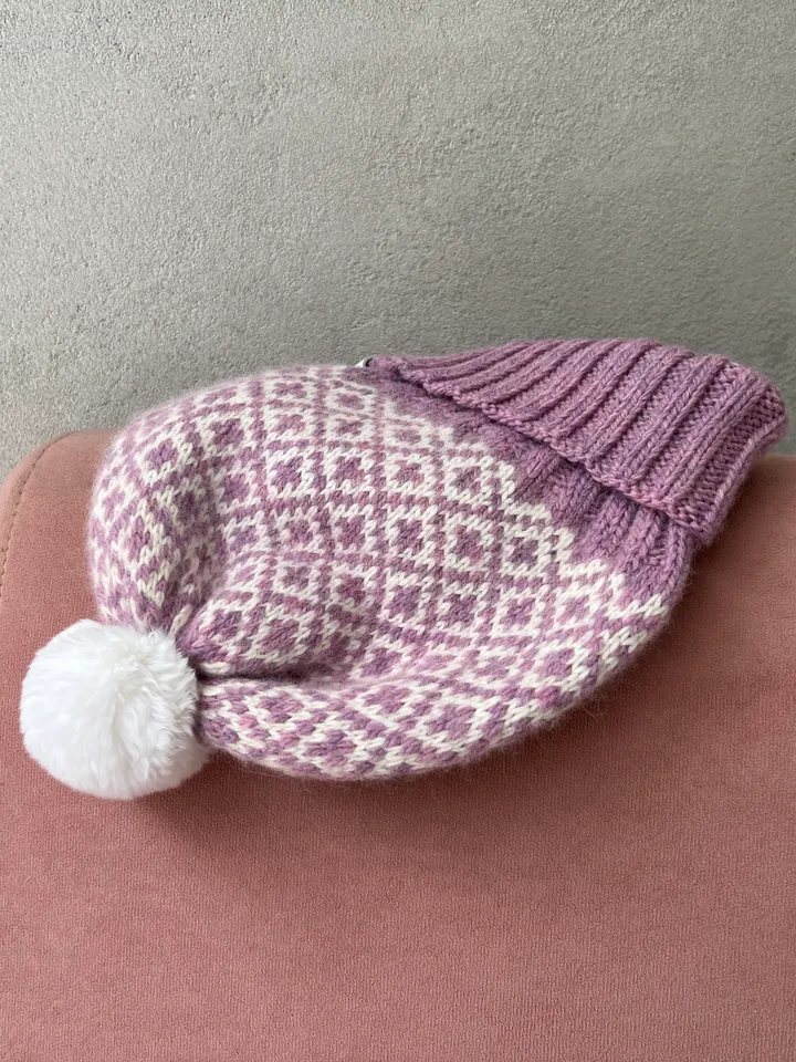 Warm womens hand-knitted hat