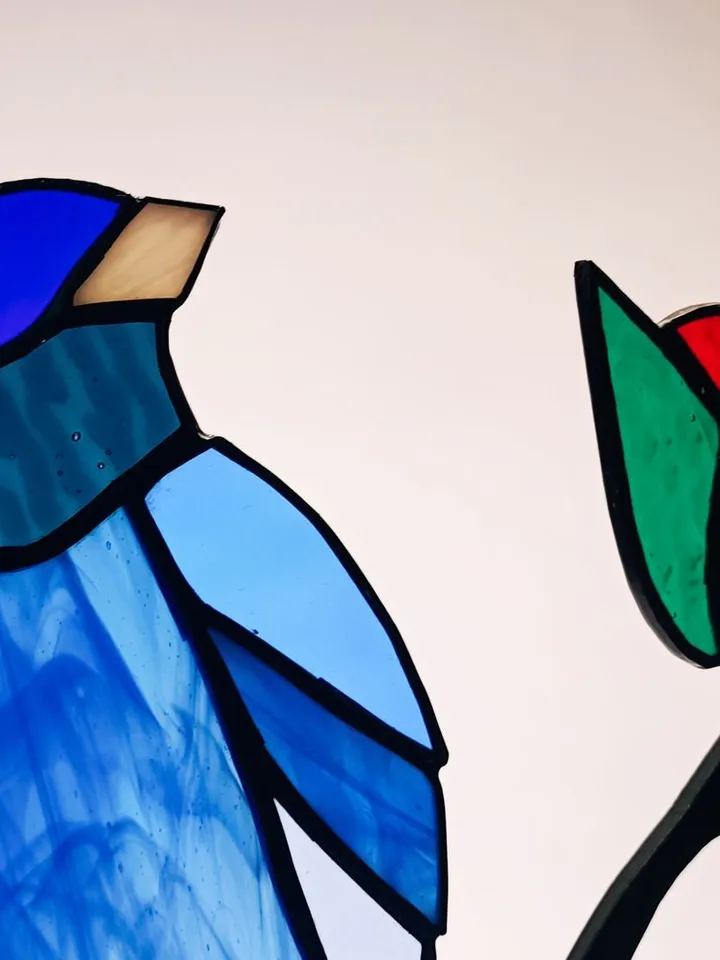 Stained Glass: The Bluebird. A Composition of Stained Glass and Iron Branch for Wall Decoration, Stained Glass with a Bluebird