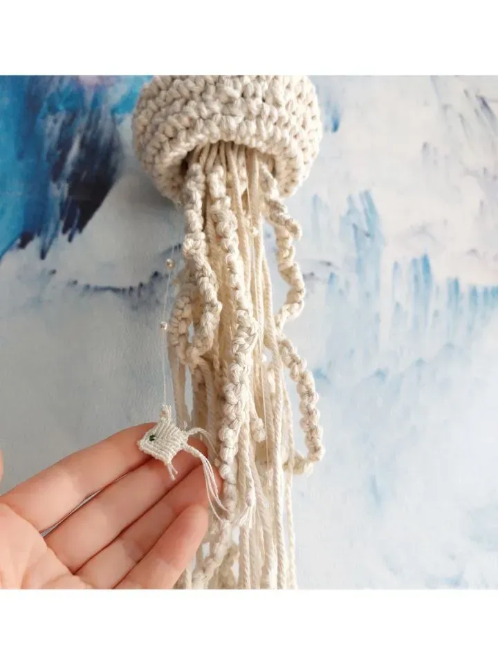 Macramé jellyfish ornament. Wall decor in the form of a jellyfish. Modern macramé. Home decor in coastal style. crocheted jellyfish