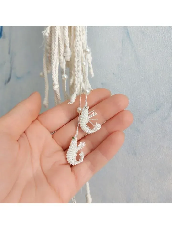 Macramé jellyfish ornament. Wall decor in the form of a jellyfish. Modern macramé. Home decor in coastal style. crocheted jellyfish