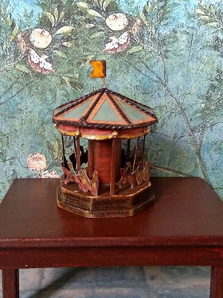 Miniature carousel. Dollhouse miniature.1:12 scale.