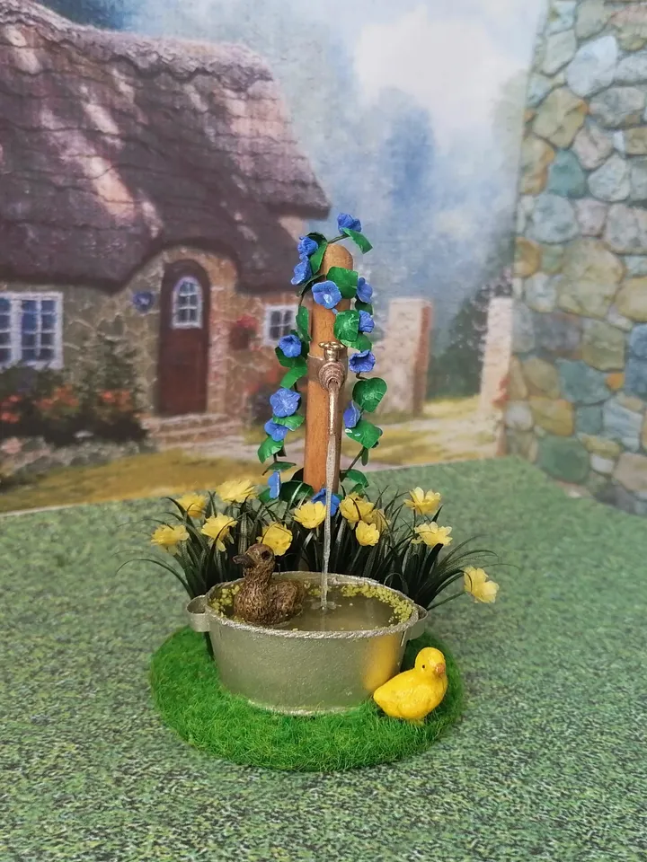 Composition for a puppet garden. Dollhouse miniature 1:12.