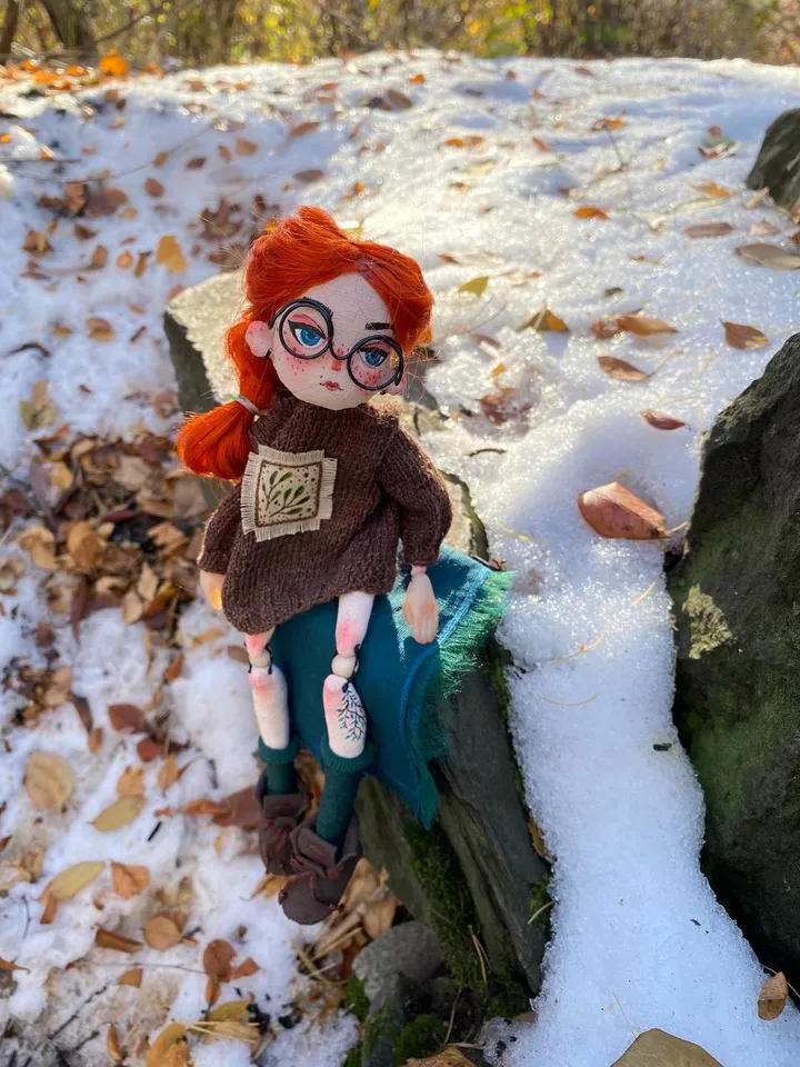 Red-haired doll with goblincore and cottagecore style with tattoos