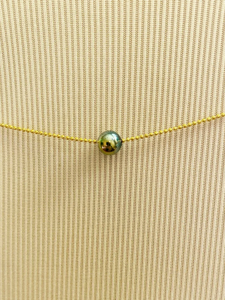 Pendant on a chain for the neck. Handmade jewelry.