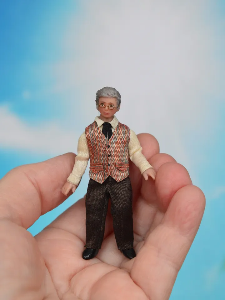 Man doll in 1/24 scale. Miniature doll for a dollhouse.