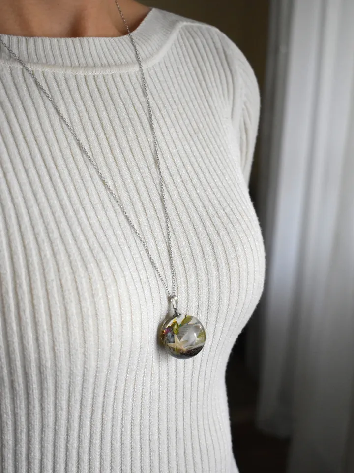 Shell with a pearl pendant. Sea pendant with shell, pearl and real flowers. Pinctada pendant.