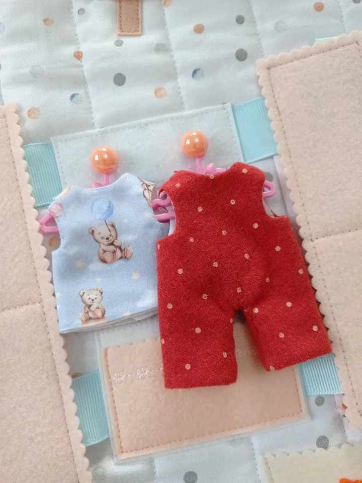 Textile Dollhouse with felt doll by clothes, baby house, Gift for a girl, Baby care - a book for boys and girls.