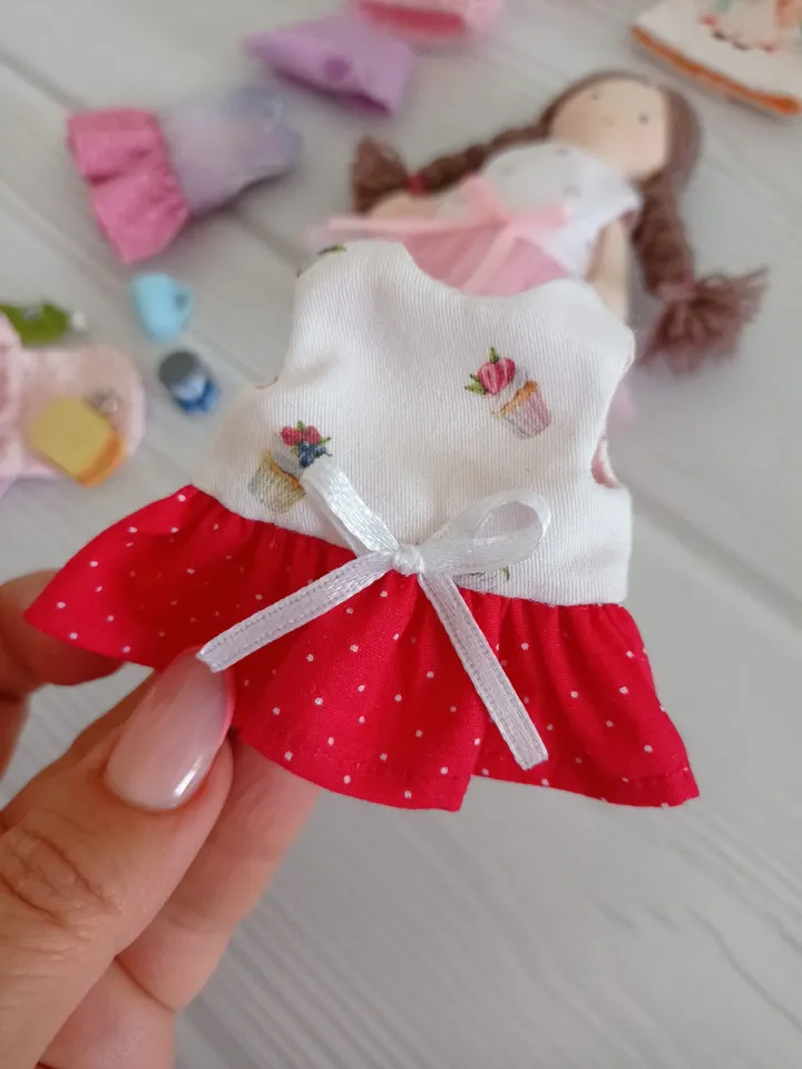 Textile dollhouse with felt doll for clothes, Gift for girl and boy, Baby care - book for boys and girls.
