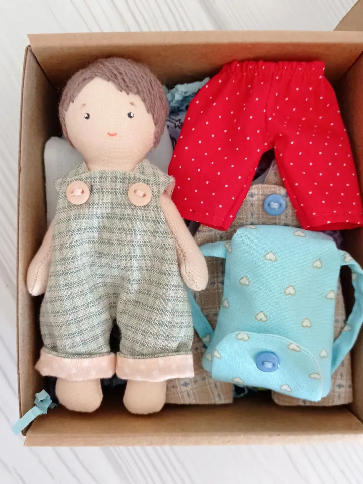 Textile dollhouse with felt doll for clothes, Gift for girl and boy, Baby care - book for boys and girls.