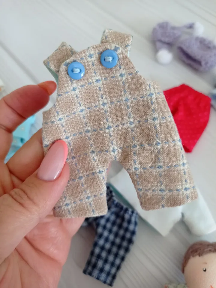 Textile dollhouse with felt doll for clothes, Gift for girl and boy, Baby care - book for boys and girls.