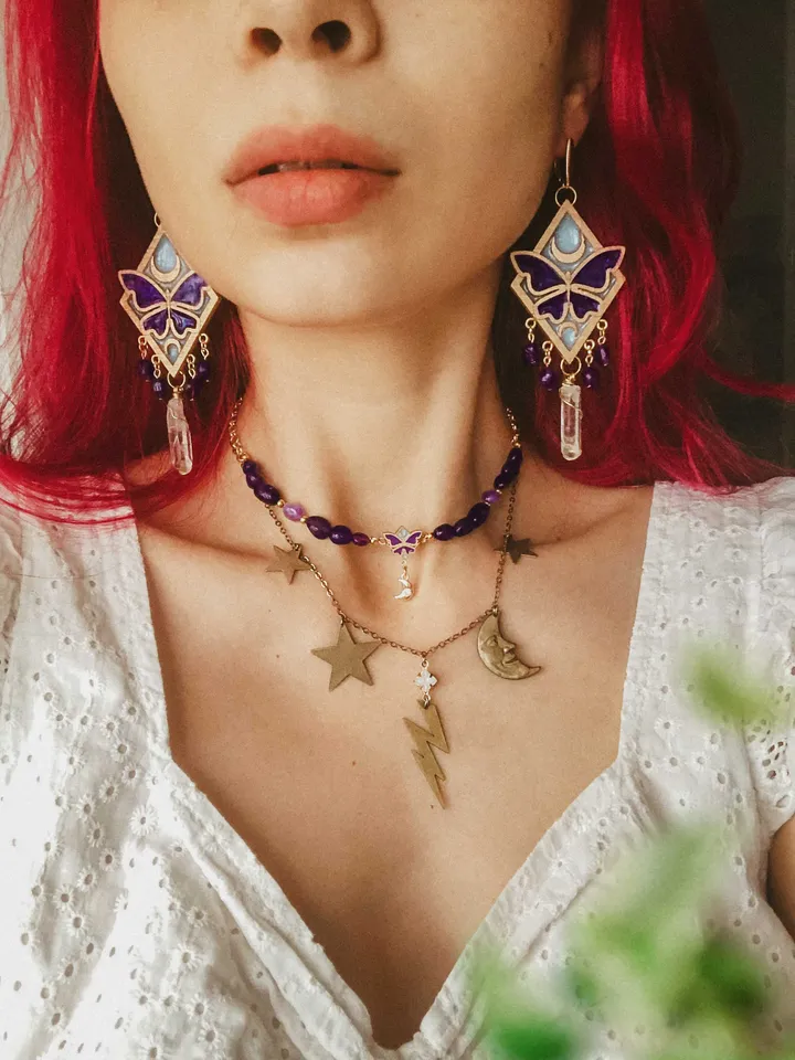 Big statement earrings Moonlight Serenity with amethyst and clear quartz crystals. Gold jewelry with butterflies and moons in light blue and deep purple color and iridescent shine. Maylina Soul