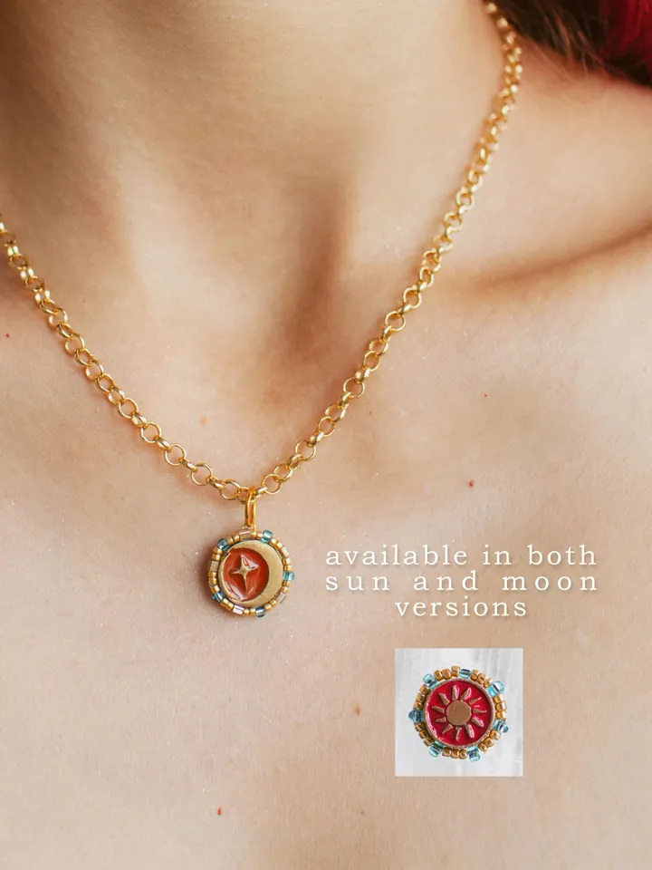 Small pendant necklace When The Sun Meets The Moon on a thick chain. Gold stackable jewelry with celestial design in sunset red or orange color with beading. Maylina Soul