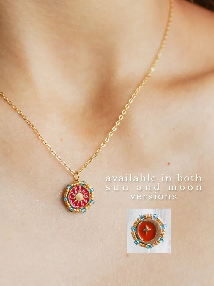 Small pendant necklace When The Sun Meets The Moon. Gold stackable jewelry with celestial design in sunset red or orange color with beading. Maylina Soul
