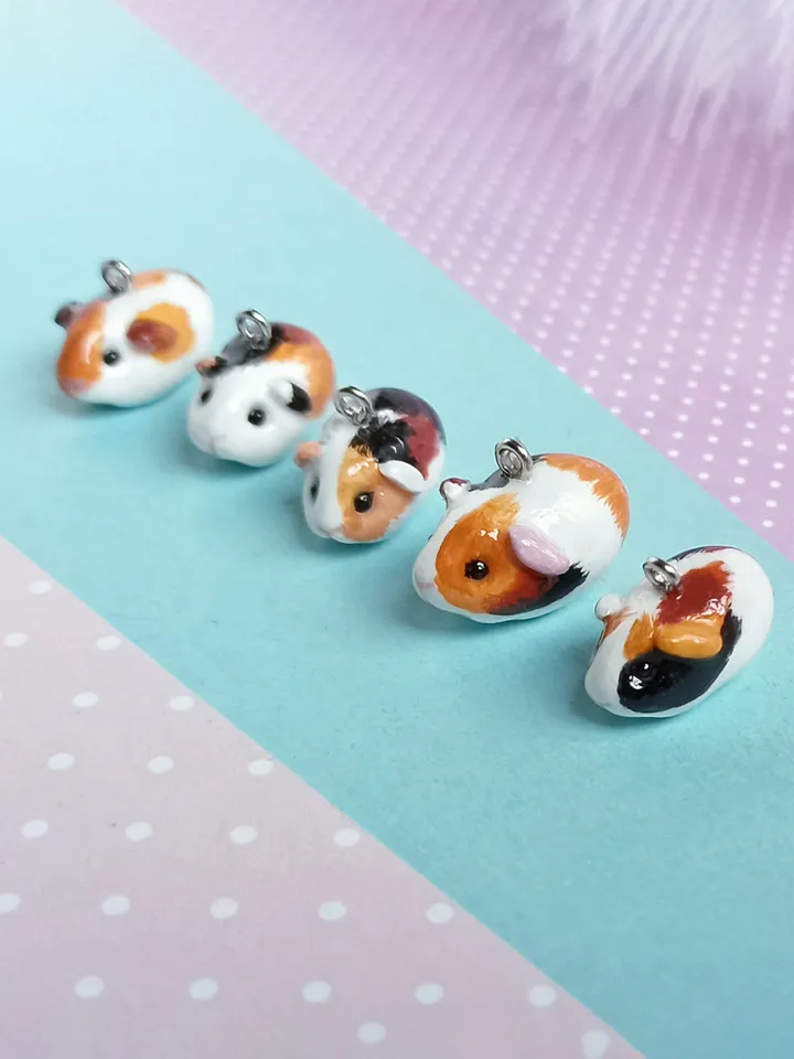 a Handmade guinea pig necklace rundom color  (pre-order)