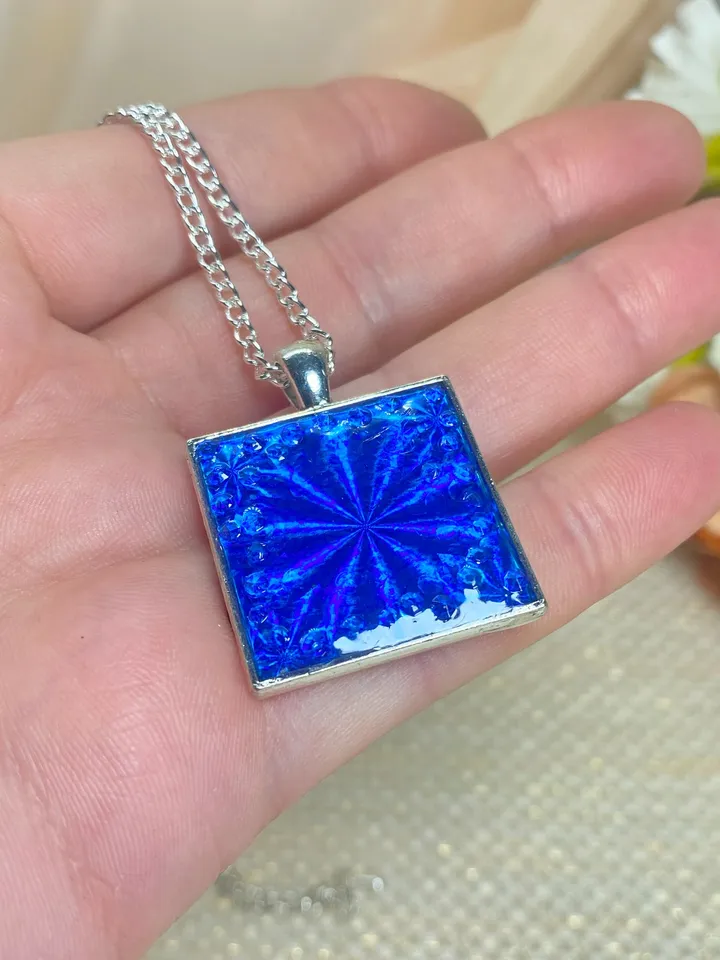 Bright blue 3D handmade pendant. Author's design. Handmade.