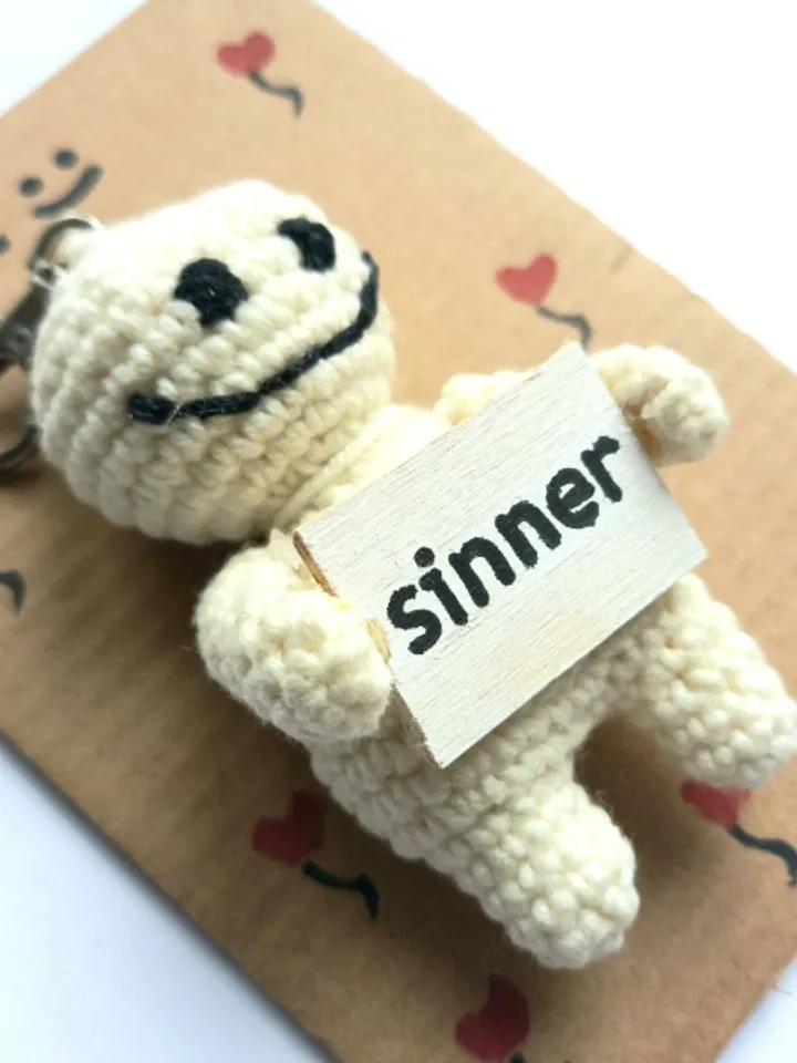 The keychain "sinner" for a bag or keys, a toy in the car interior, a pendant for the rearview mirror