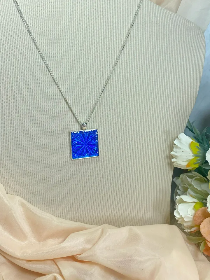 Bright blue 3D handmade pendant. Author's design. Handmade.