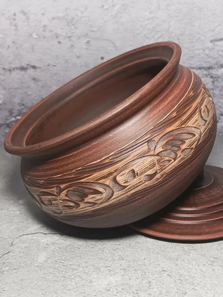 Pottery casserole. Handmade from red clay, carved pattern. Eco-friendly product