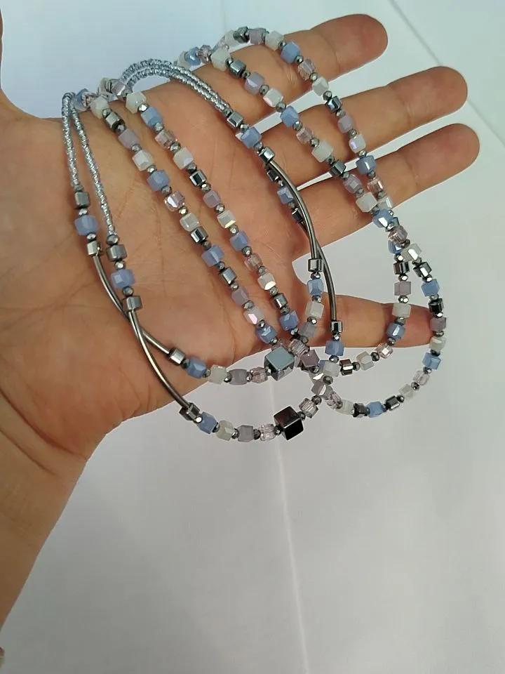 Handmade set of necklaces and earrings with cube beads. Geometric jewelry