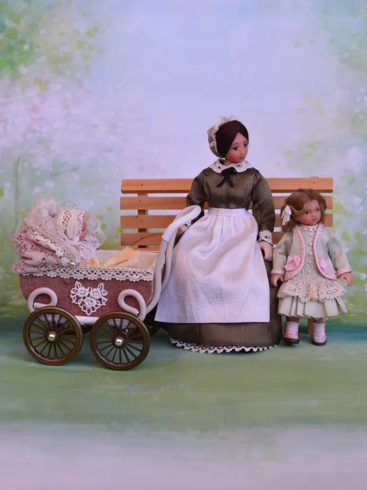 Miniature nanny doll for Victorian dollhouse in 1/12th scale.