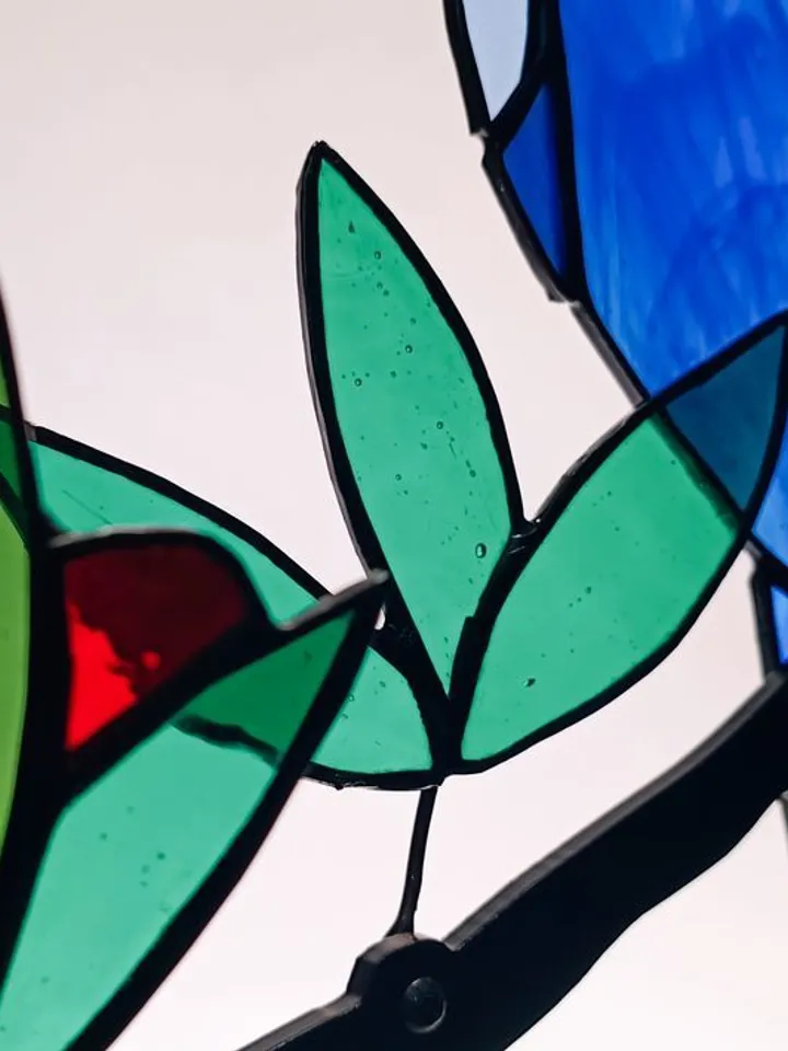 Stained Glass: The Bluebird. A Composition of Stained Glass and Iron Branch for Wall Decoration, Stained Glass with a Bluebird