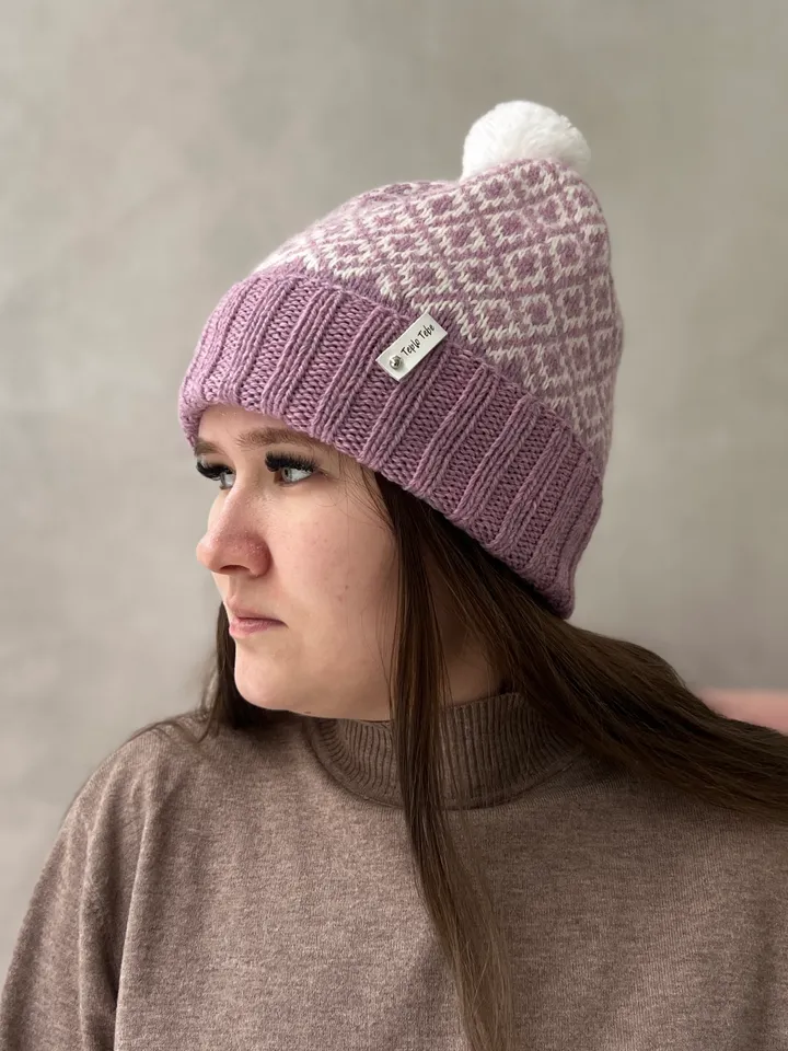 Warm womens hand-knitted hat