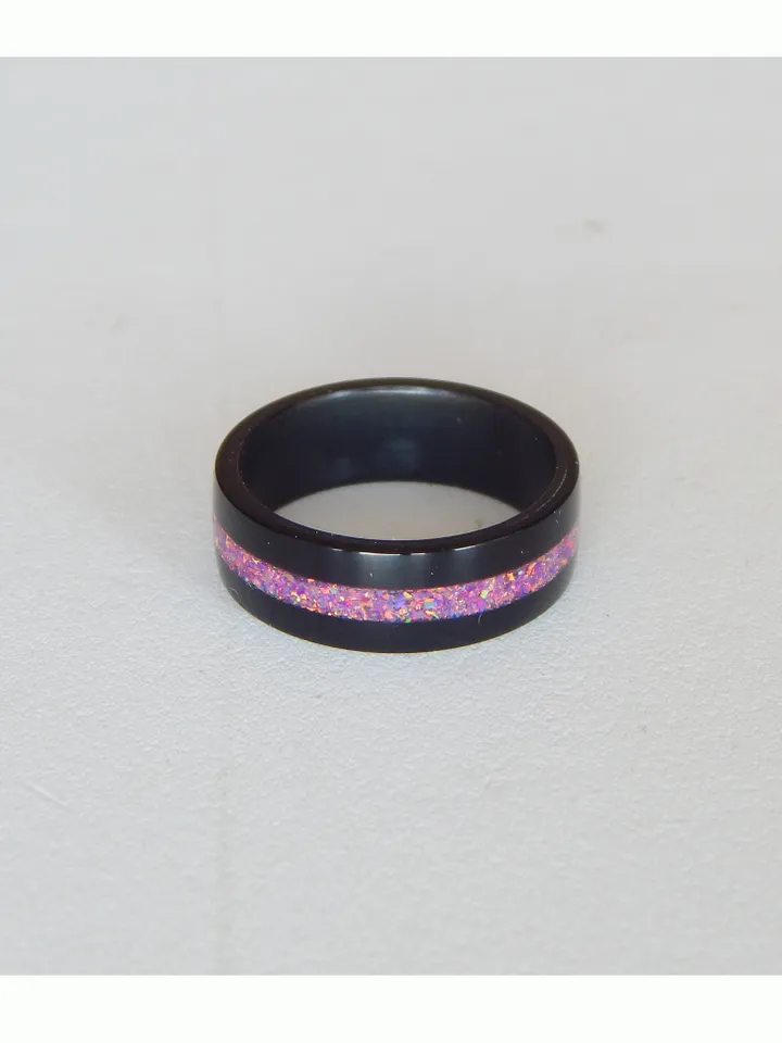 Stylish black ring. Carbon ring with synthetic opal. 7