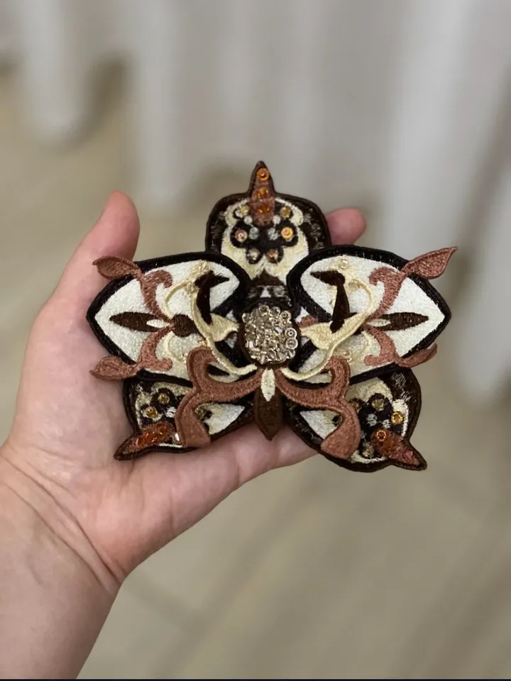 Fantasy flower brooch FSL, created on the basis of an ancient pattern.