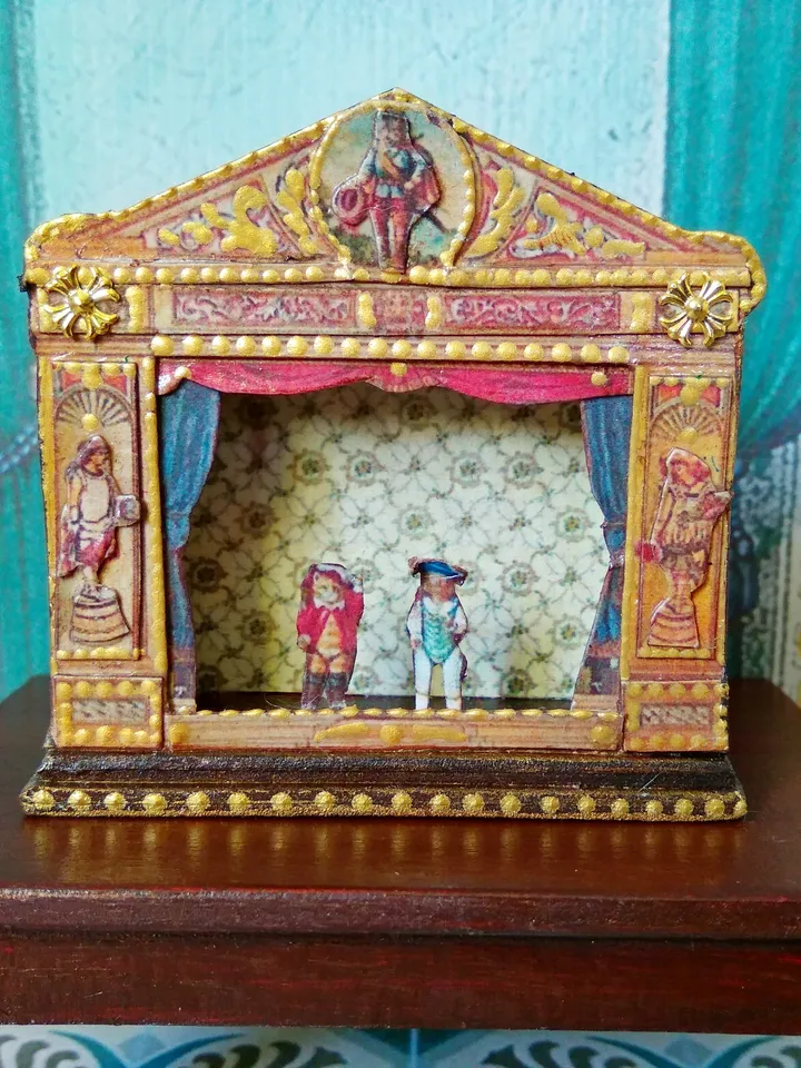 Miniature puppet theater for doll houses.