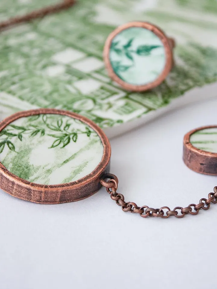 Unique handmade porcelain pendant in a copper frame made using the electroforming process