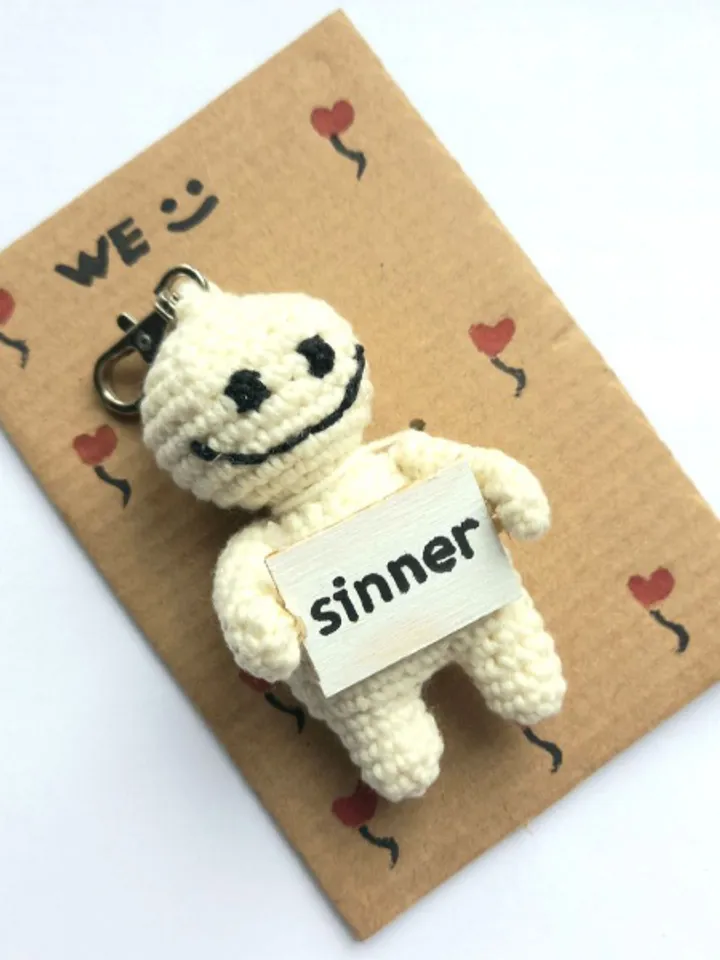 The keychain "sinner" for a bag or keys, a toy in the car interior, a pendant for the rearview mirror