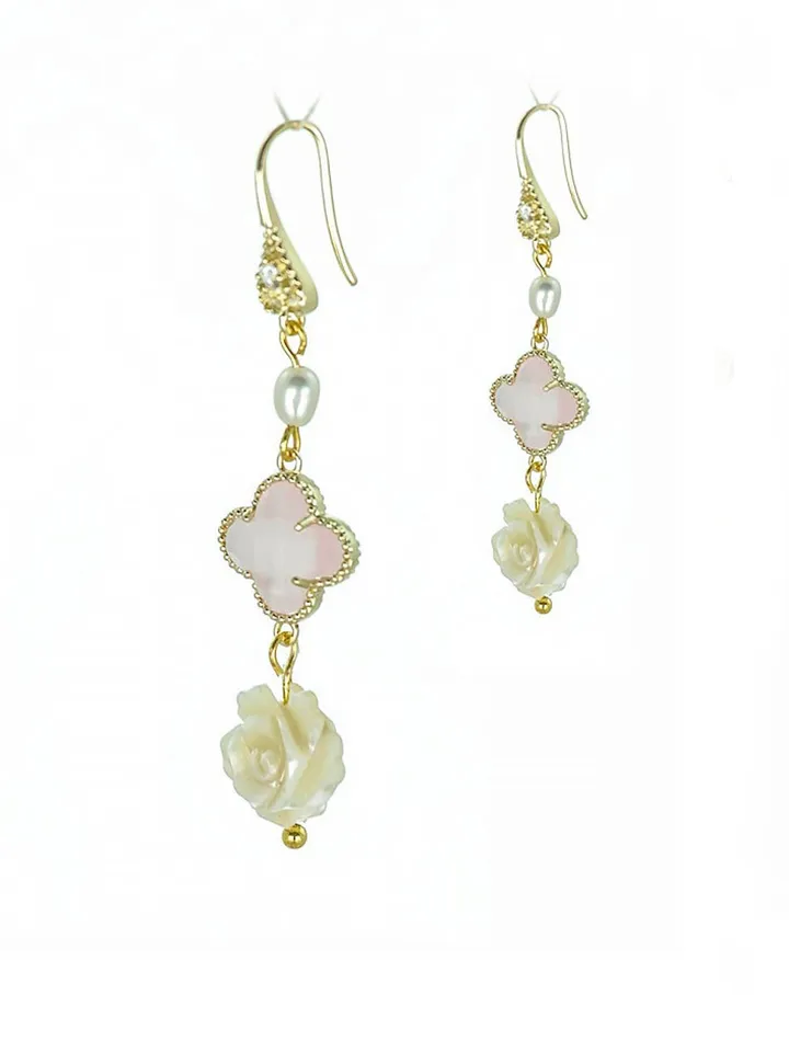 Earrings with carved pink pinks and pink elements