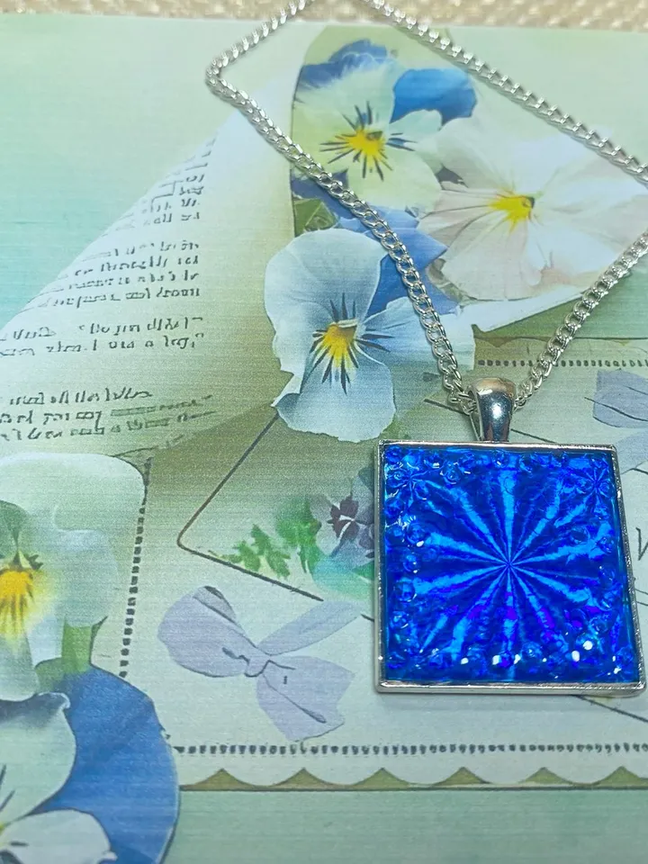 Bright blue 3D handmade pendant. Author's design. Handmade.