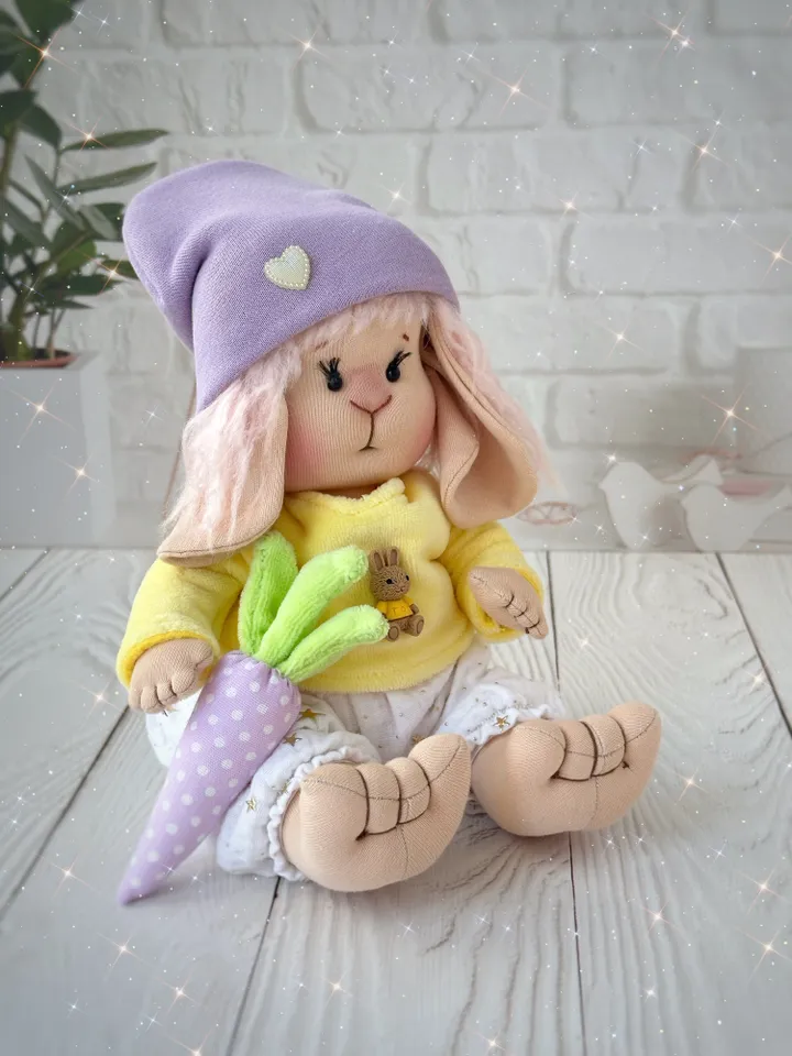 Lovey bunny toy. Handmade cute stuffed rabbit with clothes and carrot. Soft rag bunny doll for Easter gift.