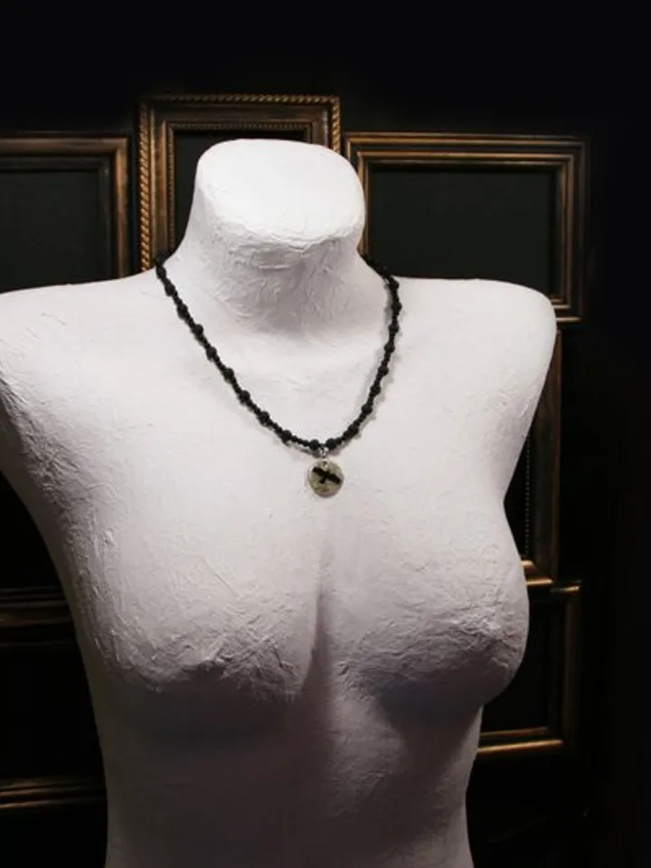 Raven or crow necklace with love rune on the other side. Nacre pearl pendant