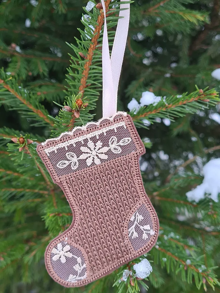New Year's set of designs of six Christmas tree decorations and a gift box.