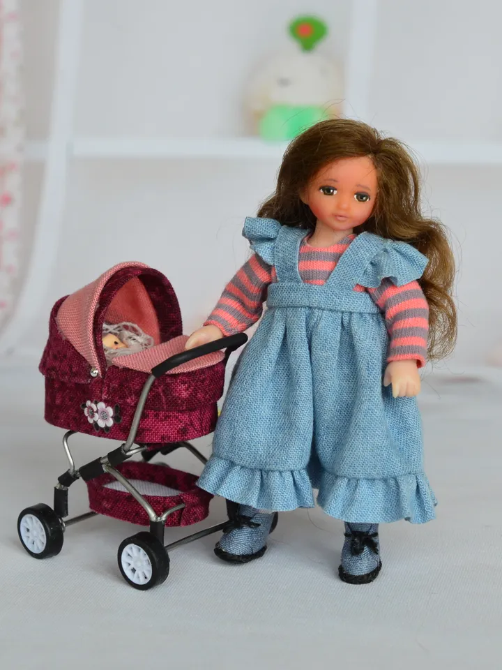 Miniature doll. Doll girl. Doll for a dollhouse.1 12 scale.