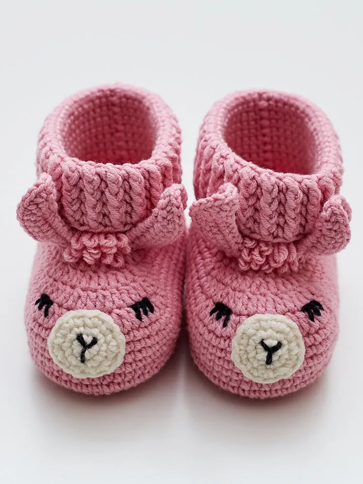 New mum pregnancy gift box with cute llama alpaca nursery toy and funny animal baby booties. Unique its girl shower reveal present basket
