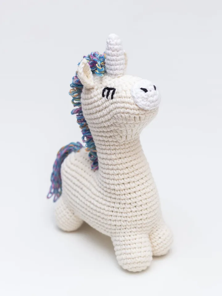 Baby boy unicorn rainbow shower gift with striped baby blanket and crochet unicorn toy