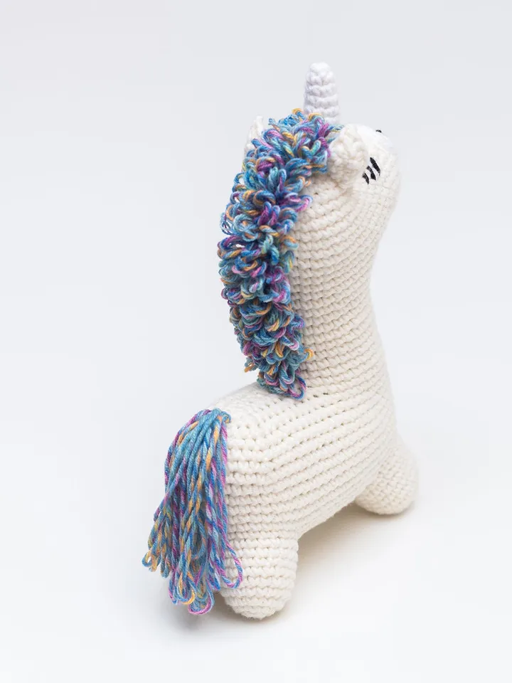 Baby boy unicorn rainbow shower gift with striped baby blanket and crochet unicorn toy
