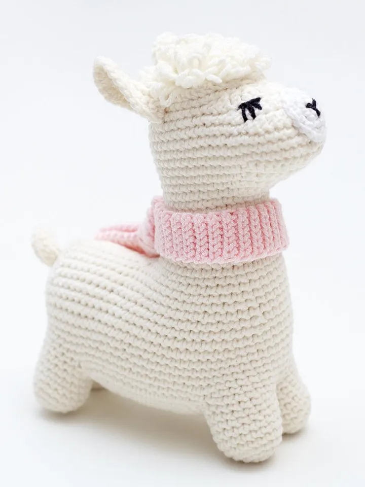 New mum pregnancy gift box with cute llama alpaca nursery toy and funny animal baby booties. Unique its girl shower reveal present basket