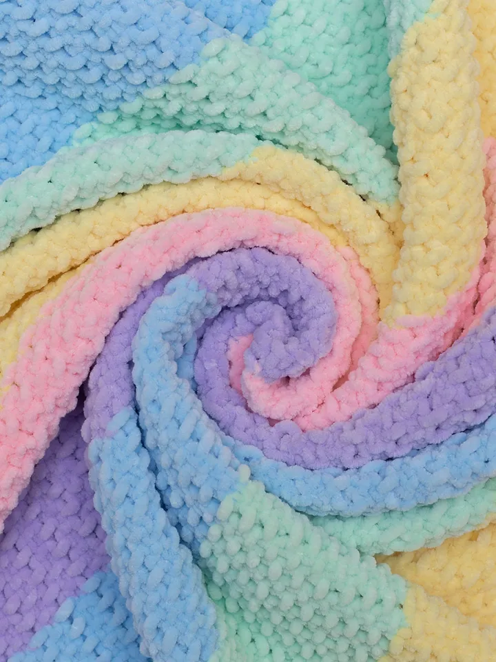 Pregnancy gift basket with crochet unicorn booties sweet toy and rainbow striped multicolored blanket Bright newborn new mom parents gift