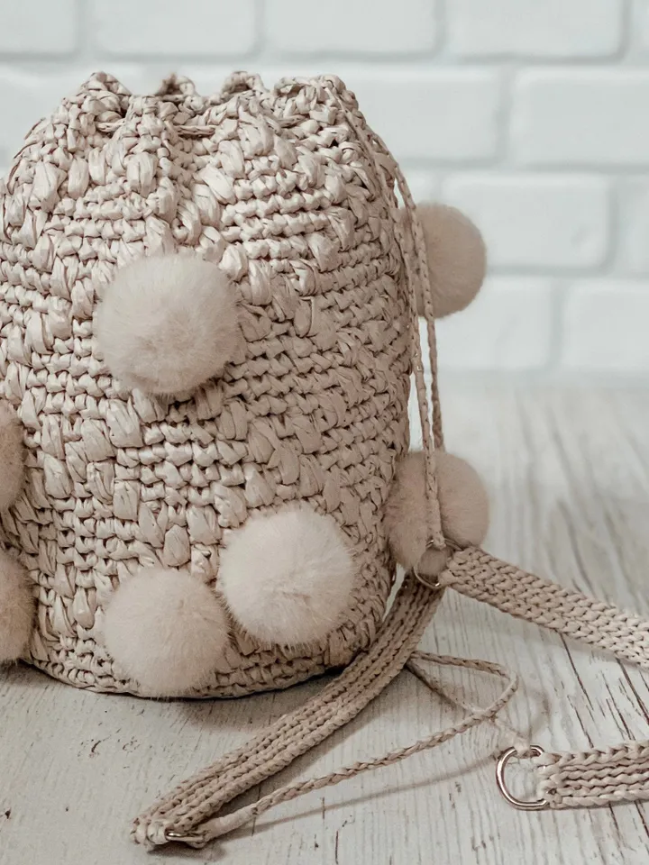 Ivory backpack with raffia yarn, bucket transformer bag with pom-poms, basket crochet hip bag, barrel keg, round shoulder