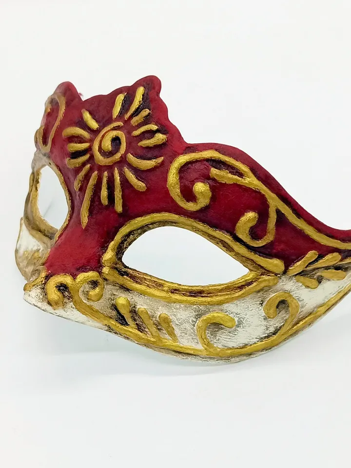 Red masquerade mask women to cosplay costume of Marie antoinette style design. Red gold venetian mask to masquerade costume.