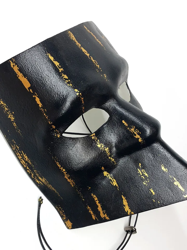 Bauta mask. Gold and black masquerade mask men. Venetian mask to carnival costume.